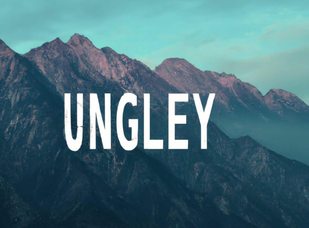 A beautiful background of mountains image with ugly jubled text covering up the image